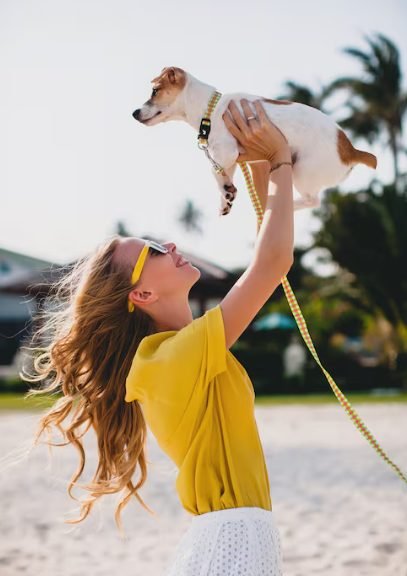 A happy owner with her dog